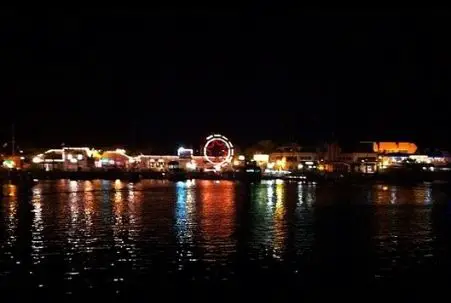 Balboa Fun Zone at Night from Newport Bay