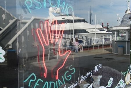 Psychic's neon sign at Balboa Fun Zone in Newport Beach, CA