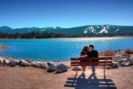 Couple kissing at Big Bear Lake.
