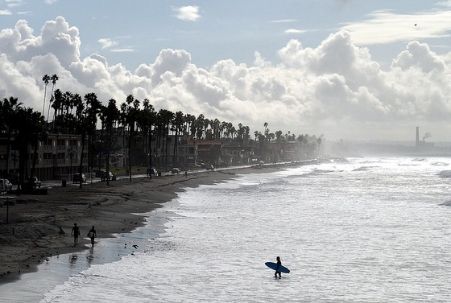 Surfers at North County San Diego Beach