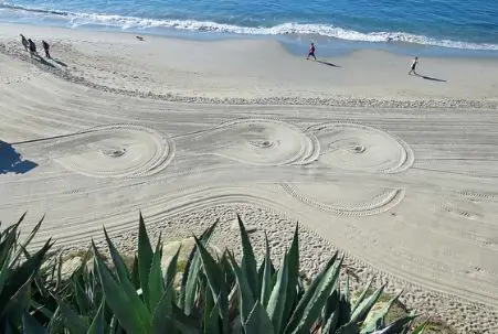 Sand Patterns made by a vehicle at Laguna Beach, CA