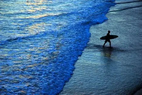 Surfer in Huntington Beach, CA